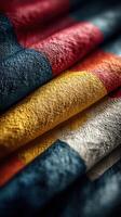 Textured fabric display with vibrant colors showcasing rich craftsmanship in a close-up view photo