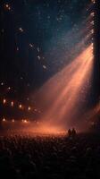 Crowd gathers in dim theater as beams of light illuminate stage and audience during a captivating performance photo