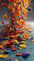 Colorful confetti cascading down on a textured surface during a festive celebration photo