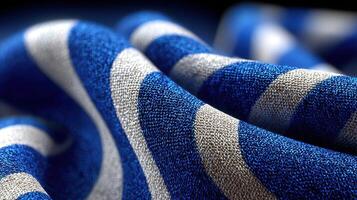 Textile featuring blue and white stripes creates a captivating visual effect in close-up study of fabric texture and design photo