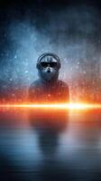 Mysterious figure in hoodie and headphones stands in a glowing ambient setting with reflections and dramatic lighting photo