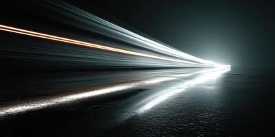 Dynamic light trails on a dark urban road at night showcasing movement and energy photo