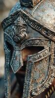 Detailed view of a weathered ancient warrior helmet displayed in historical reenactment setting photo