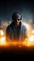 DJ performing at an energetic night event with lighting effects and vibrant atmosphere photo