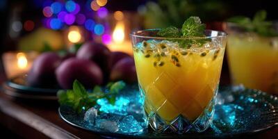 Refreshing tropical cocktail with passion fruit and mint served on a vibrant evening photo