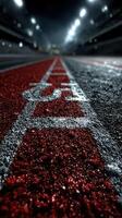 Running track at night showing detailed textures and lighting effects in a sports facility photo