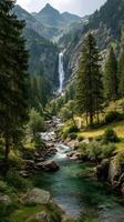 Majestic waterfall cascading through lush forested valley in the mountains during daytime photo