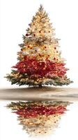 Festive Christmas tree adorned with white and red decorations, reflecting on a serene surface photo
