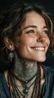 Smiling person with curly hair and tattoos demonstrates self-expression through body art photo