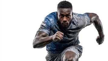Athlete in blue sportswear runs vigorously in a studio during a training session focused on speed and endurance photo