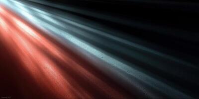 Light beams in contrasting colors creating a mesmerizing abstract pattern on a dark surface photo