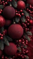 Decorative red ornaments and berries adorn a festive arrangement for the holiday season photo