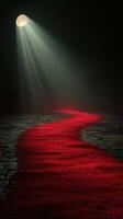 Moonlit path illuminated by soft light leading through darkness, with a striking red trail in a mysterious setting photo