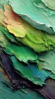 Colors blend in vivid layers of paint showcasing texture and abstract beauty photo