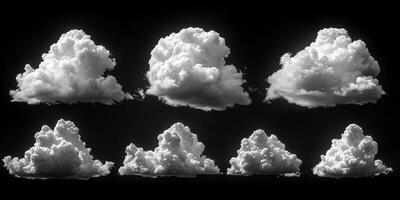 Various types of fluffy clouds against a dark sky showcase unique shapes and formations during the afternoon photo