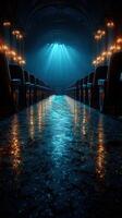 Dramatic atmosphere fills a vintage theater with illuminated seats and a reflective floor during a quiet moment before the performance photo