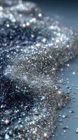 Sparkling glitter cascades across a surface in a stunning display of light and texture photo