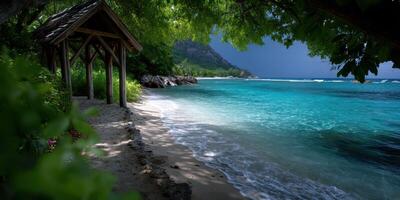 Secluded beach with tropical water and gentle waves under a partially cloudy sky near lush greenery photo