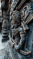 Intricate stone carving of a warrior with bow located in an ancient temple during daylight photo