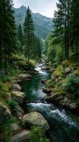 Tranquil river flowing through lush green forest in the mountains during a cloudy day photo