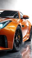 Sporty orange car showcases sleek design and dynamic features in a modern indoor setting during daylight photo