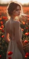Young woman enjoying a poppy field at sunset with a woven basket in hand photo