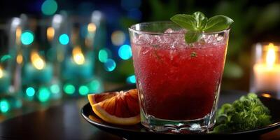 Refreshing cocktail with vibrant colors and garnishes in a cozy setting at night photo