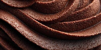 Rich and creamy chocolate mousse with smooth texture, ideal for desserts and culinary creations photo