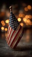 American flag displayed proudly against a warm, blurry background of lights creating a festive atmosphere photo