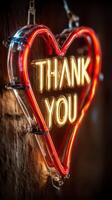 Neon heart sign displaying Thank You illuminated in warm colors for a cozy atmosphere in a modern cafe photo