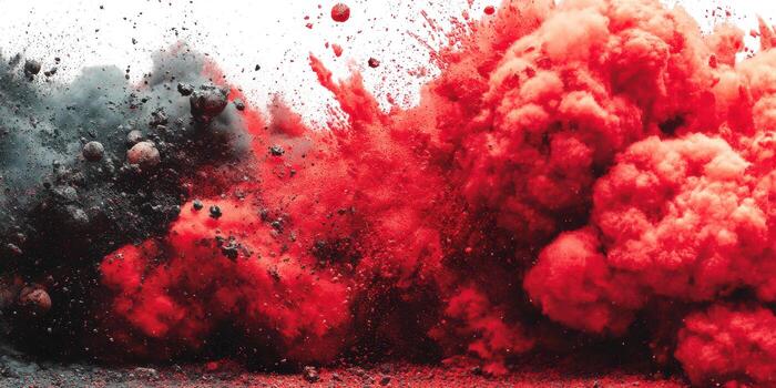 Bright red and dark smoke clouds emerge from a unique explosion in a creative display of colors during an outdoor event in the daytime photo
