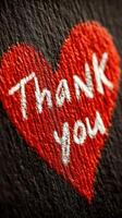 Heartfelt message of appreciation with stitched lettering on textured fabric background photo