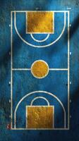 Brightly colored basketball court marked with blue and yellow lines in a sunny urban setting photo