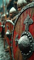Medieval warriors prepare for battle with shields in a historic reenactment setting photo