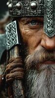 Portrait of a warrior holding an axe, captured in a historical reenactment event in autumn photo