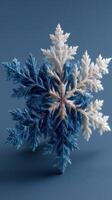 Beautifully detailed snowflake captured in blue and white hues, showcasing intricate natural patterns on a cold winter day photo