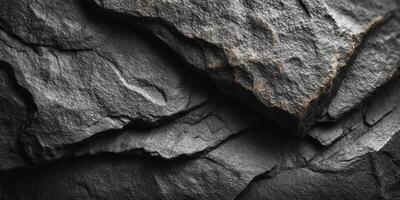 Natural slate rock formation showing layers and textures in close-up with soft lighting photo