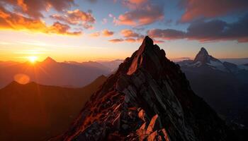 Majestic mountain peaks under golden sunset sky with vibrant clouds and breathtaking nature landscape scenery photo