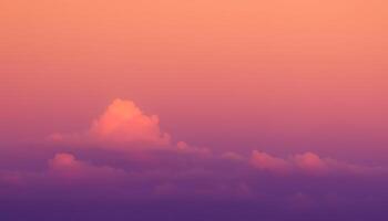 Abstract sunset gradient sky transitioning smoothly from deep purple to soft pink and warm orange photo
