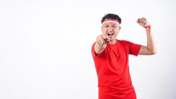 Indonesian citizen with red and white ribbon wristband celebrate independence day of Indonesia on August 17 isolated on white background photo