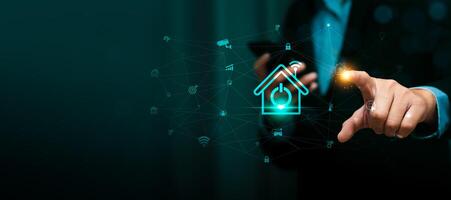Business Professional Using Mobile Device and Futuristic Digital Interface for Smart Home Control and IoT Automation, Featuring Connected Devices and Innovative Technology for Modern Living photo