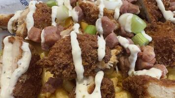 Loaded Fries with Fried Chicken, Sausage, and Green Onions photo