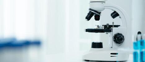 Scientist analyze biochemical samples in advanced scientific laboratory. Medical professional use microscope look microbiological developmental of viral. Biotechnology research science photo