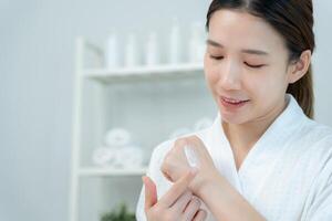 skin hand, Woman applying organic moisturizing hand cream, hand skin care concept, winter, female skin protection, beautiful woman skin care with hand cream, lotion on hands photo