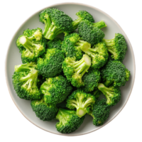 Fresh green broccoli florets arranged on a white plate isolated on transparent background cutout png