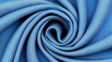 Abstract Swirling Blue Fabric Texture Close Up of Luxurious Textile Spiral photo
