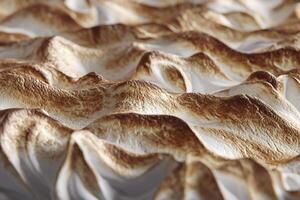Close up of a vanilla meringue. Food Background. photo