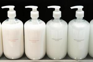 Soap or shampoo for refill. plastic bottles for refill liquid soap, shampoo and other products. Reusable Bottles for Soap and Shampoo in Zero Waste Lifestyle. photo