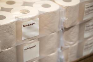 Bamboo Toilet Paper Roll. Eco Friendly, Soft and Sustainable Alternative for a Greener Future. Stack of Brown tissue paper pack. photo