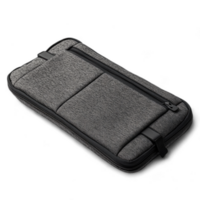 Stylish gray laptop sleeve with multiple pockets and a zipper for secure storage isolated on transparent background cutout png